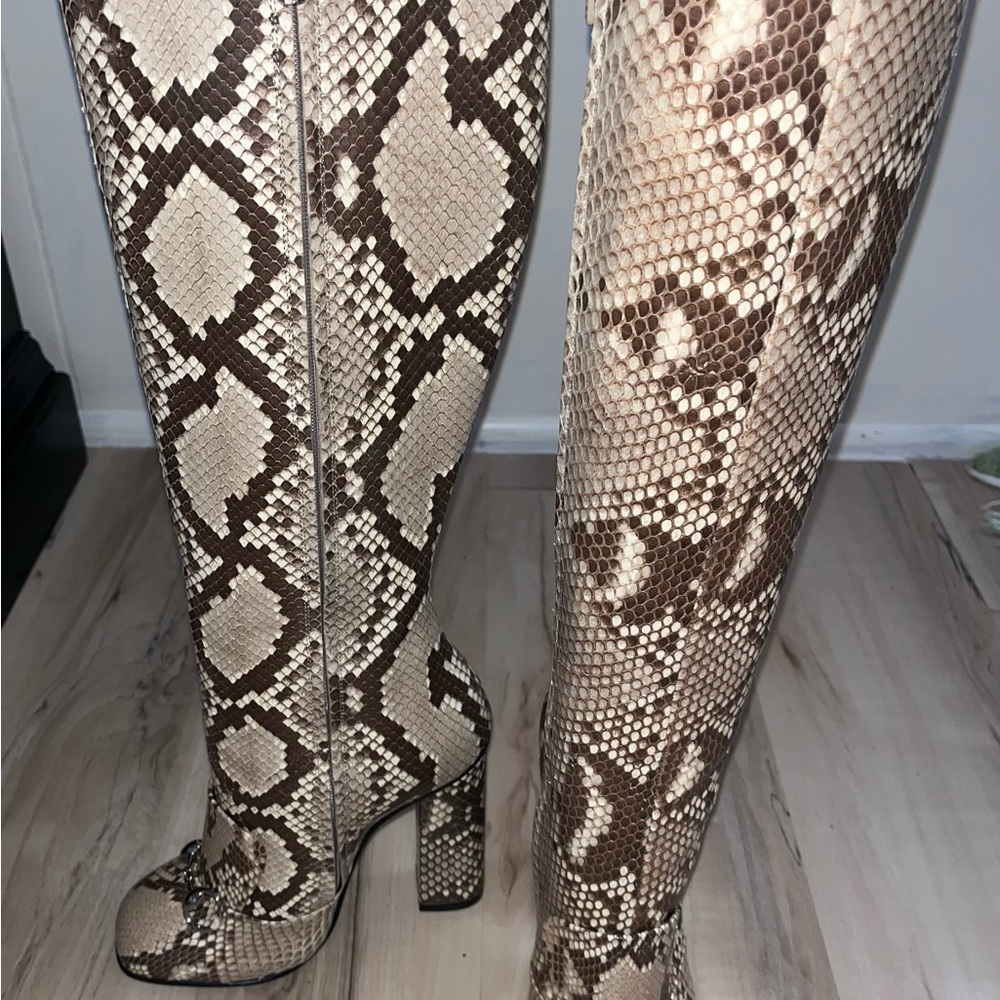 Snakeskin Gucci knee high boots